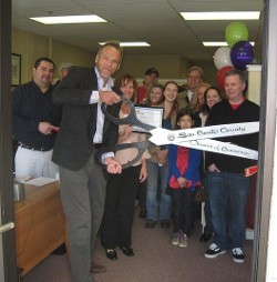 Photo of Hubois and community members at ribbon cutting